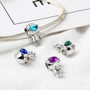 Silver astronaut charms with colorful faceted gemstones for DIY charm bracelets