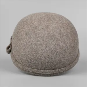 Elegant wool felt equestrian hat in oatmeal beige with side loop detail and round crown