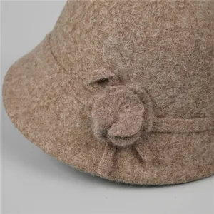 Elegant wool felt cloche hat for women featuring a 3D floral accent in camel khaki color