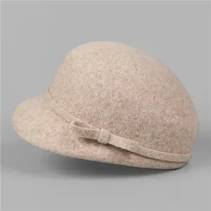 Detailed texture of elegant wool felt hat with decorative bow in vintage French style