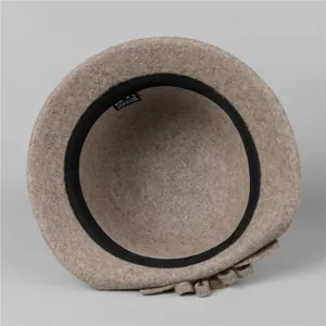 Elegant camel wool felt cloche hat for elderly women with decorative side flower detail