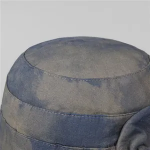 Blue retro cotton bucket hat with elegant tie-dye pattern and side flower detail