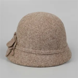 Elegant brown wool cloche hat for women with handmade flower detail for winter and autumn