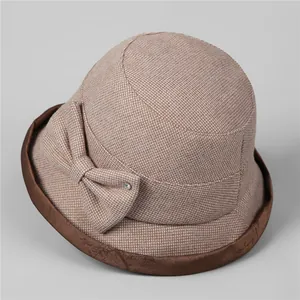 Elegant light brown checkered bucket hat for elderly women with bow and rhinestone detail