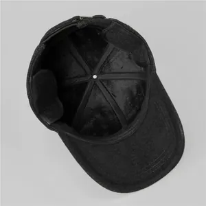 Winter wool cap for men with thick fleece lining and foldable ear flaps in deep black