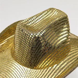 Detail of shimmering gold disco ball style sequins on a wide-brimmed cowboy hat for parties