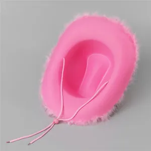 Pink western cowboy hat with fluffy feather trim and adjustable chin strap detail