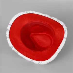 Red Christmas cowboy hat with white plush trim and colorful metallic snowflake prints