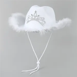 Close-up of white felt cowboy hat featuring a rhinestone crown and faux feather trim