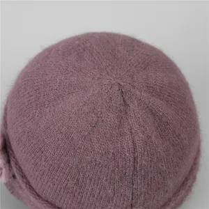 Plush purple knit hat for elderly women featuring thick warm thermal lining and fur texture