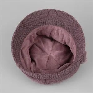 Winter knitted hat for elderly women in deep purple with warm fleece lining and ribbed brim