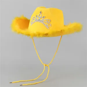 Close-up of bright yellow cowboy hat featuring fluffy feather trim and rhinestone crown