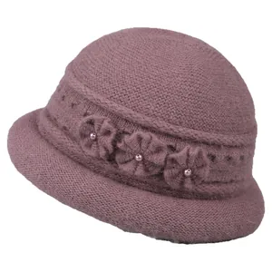Winter knit cloche hat for elderly women in dusty rose with floral pearl detail