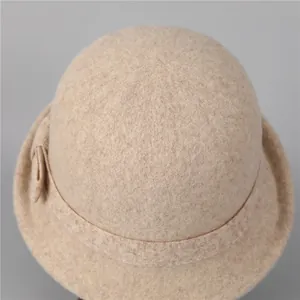 Elegant vintage wool cloche hat in oatmeal beige with bow detail for women