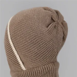 Women's winter knit beanie hat in camel color with ribbed texture and side stripe detail
