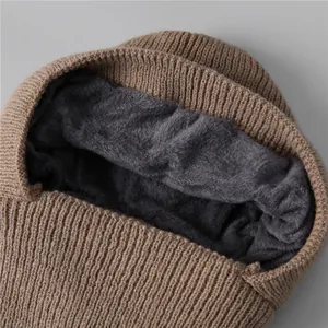 Women's warm winter knit hat with thick plush fleece lining and brown knitted texture