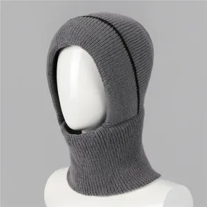 Detailed texture of gray ribbed knit winter balaclava hood with black stripe trim