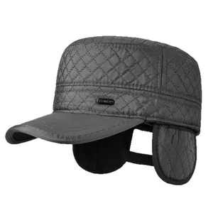 Men's winter flat top hat in dark gray with quilted pattern and warm ear flaps