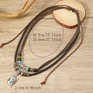 Collar bohemio de varias capas con cuerda marrón cuentas y colgante de sombrero vaquero