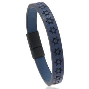 Detail of dark blue leather bracelet featuring star embossing and black magnetic clasp