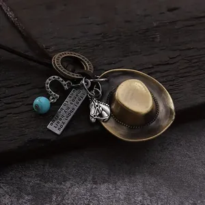 Western cowboy hat pendant necklace with faux leather cord and turquoise bead detail