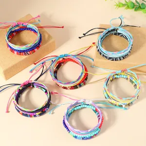 Handmade Bohemian multi-layer woven bracelets set in vibrant ethnic colors