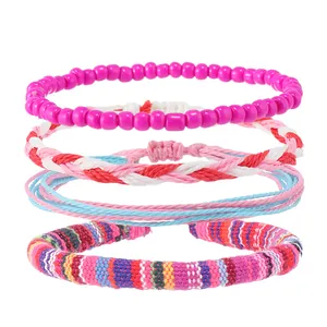 4-piece bohemian friendship bracelet set featuring colorful woven patterns and beads