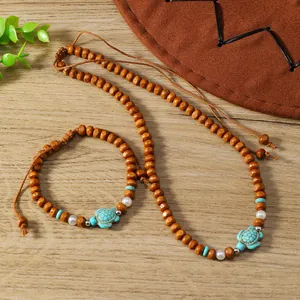 Bohemian wood bead jewelry set with turquoise turtle pendant and adjustable woven cord