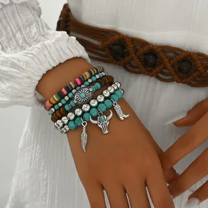 Bohemian multi-layer bracelet set with turquoise beads, bull skull and boot charms