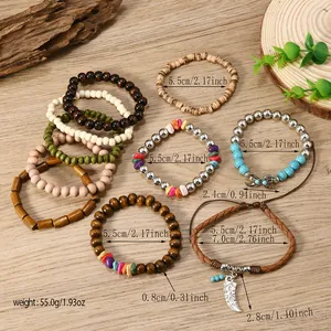 Detailed view of bohemian wood and coconut shell layered bracelets on wood surface