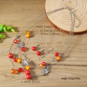 Colorful floral wire necklace and earring set with pearls and faceted amber beads