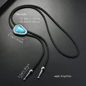 Detailed macro view showing turquoise bolo tie pendant dimensions and silver carving