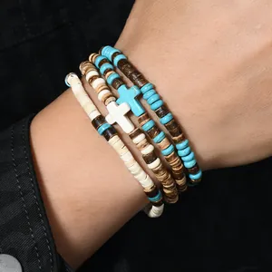 Set di quattro bracciali in perline di turchese e cocco con ciondoli a croce