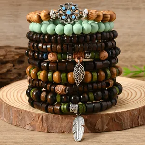 Bohemian multilayer wooden bead bracelet set with leaf charms and elastic string.
