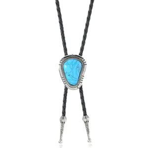 Western cowboy Bolo Tie with turquoise stone and black braided cord on white background