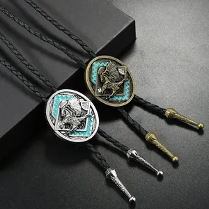 Vintage Western-Bolo-Tie mit Adler-Anhänger und Türkis-Akzenten an schwarzem Lederband