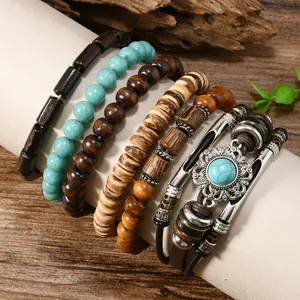 Detailed view of bohemian multilayer bracelet set with wood beads and silver flower charm