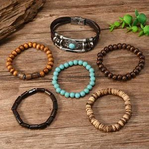 Detail of six-piece bohemian set with leather, turquoise beads and natural wood textures