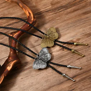 Vintage Westliche Bolo-Krawatte mit Schmetterlings-Anhänger in Gold und Silber auf Leder