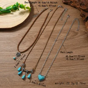 Close-up of bohemian layered necklace set with turquoise charms and detailed dimensions