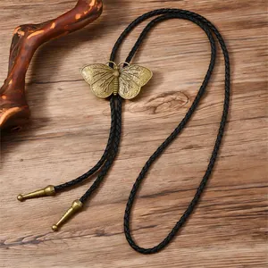 Details von Vintage-Bronze-Schmetterling Bolo Tie mit geflochtenem schwarzem Leder