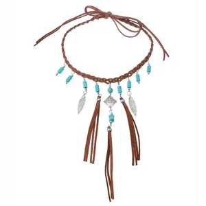 Collier bohème avec perles turquoise, pendentifs feuilles argentées et pompons bruns