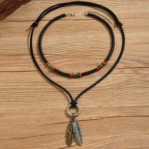 Mens 2-piece layered necklace with leather cords, wood beads and metal feather pendants