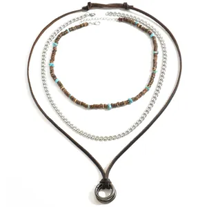 Three-layer vintage necklace with turquoise beads, silver chain and leather cord with rings