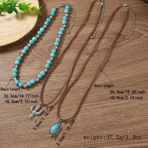 Detailed view of western style turquoise beaded necklace and cactus pendant set with dimensions