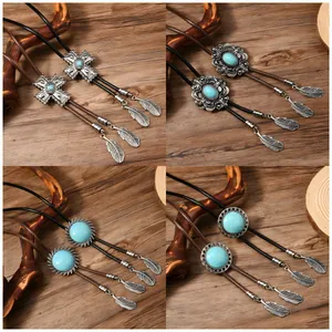 Vintage Western Cowboy Bolo Tie Legierung Synthetischer Türkis Kreuz Sonnenblume Zahnrad Muster Geflochtenes PU Leder Seil Halskette Mit Feder Quasten Unisex Schmuck