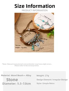 Detail of bohemian jewelry set with bull skull charms and turquoise beads on wood