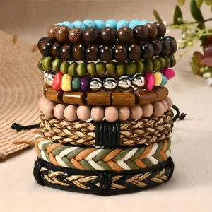 Close-up of bohemian multilayer bracelet set with wood beads and turquoise stones