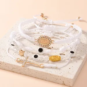 Set di 4 braccialetti intrecciati con ciondoli della Vergine Maria, croce e occhio