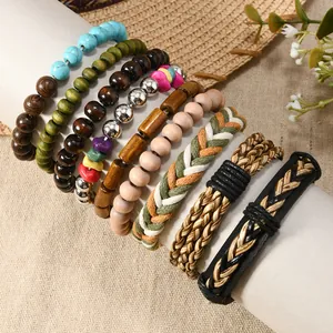 Detailed stack of Bohemian coconut shell and wood bead bracelets on a white display stand